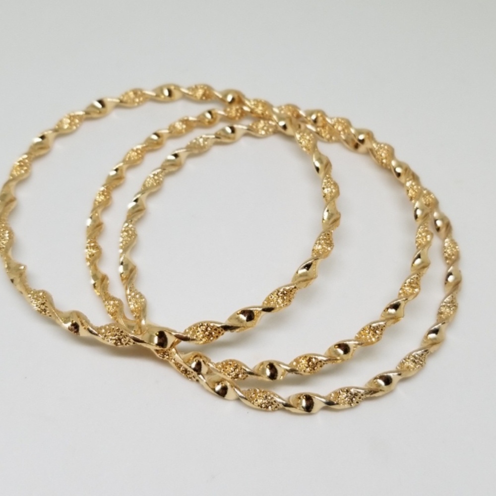 3 Gold Tone Twisted Bangle Set